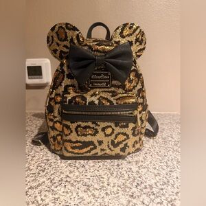 Loungefly Gold and Black Leopard Backpack with Bow